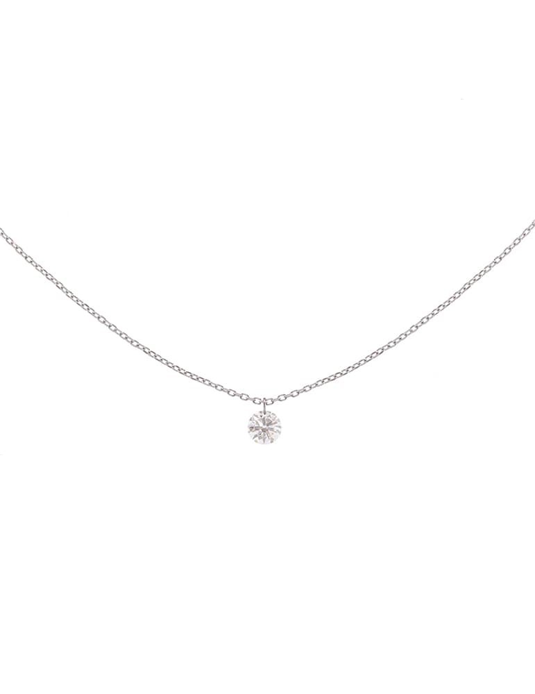 Colgante de oro blanco 18K con brillante de 0,15 ctes en engaste en vuelo