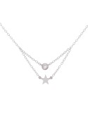 Colgante de oro blanco 18K con estrella y brillante de 0,02 ctes en chatón