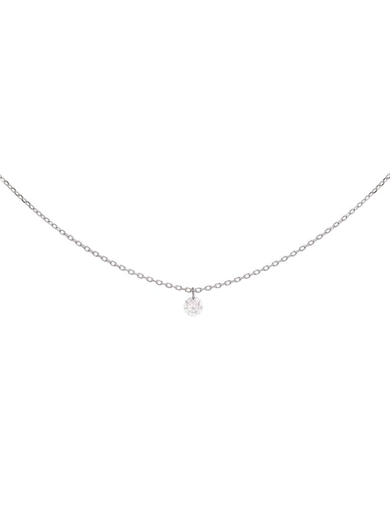 Colgante de oro blanco 18K con brillante de 0,10 ctes en engaste en vuelo