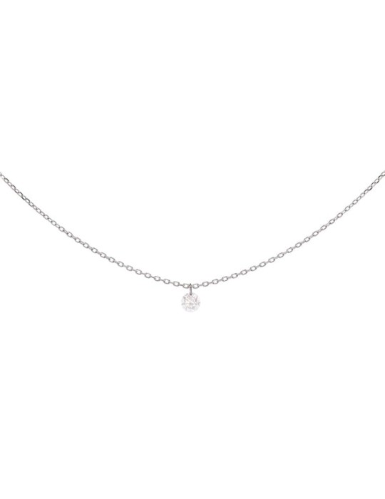 Colgante de oro blanco 18K con brillante de 0,10 ctes en engaste en vuelo