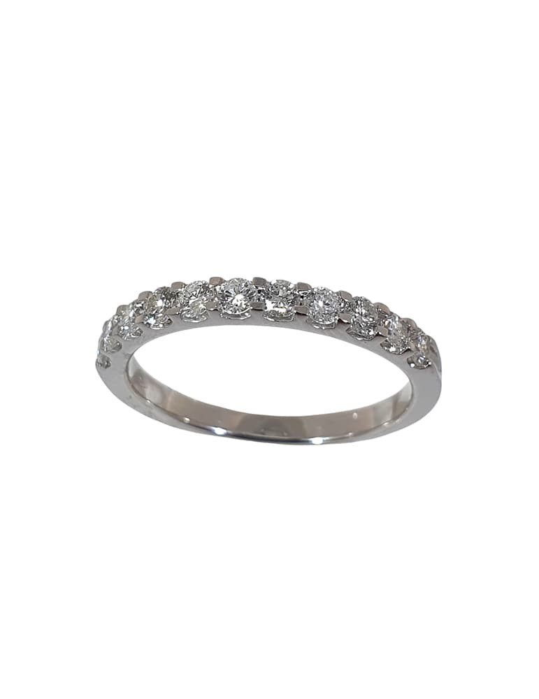 Anillo media alianza de oro blanco 18K con 11 brillantes en garra en U de 0,50 ctes