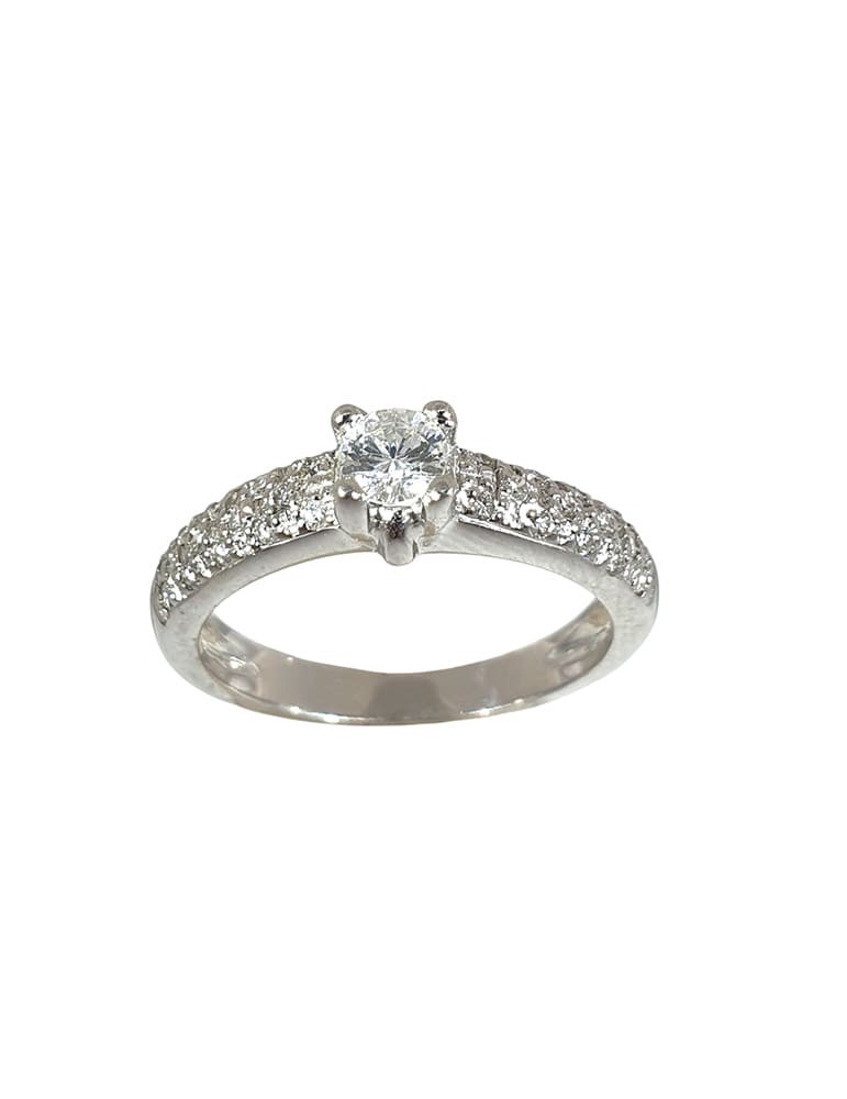 Anillo de oro blanco 18K con brillante central y pavé de brillantes de 0,48 ctes