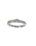 Anillo de oro blanco 18K con brillante central y diamantes en carril de 0,62 ctes