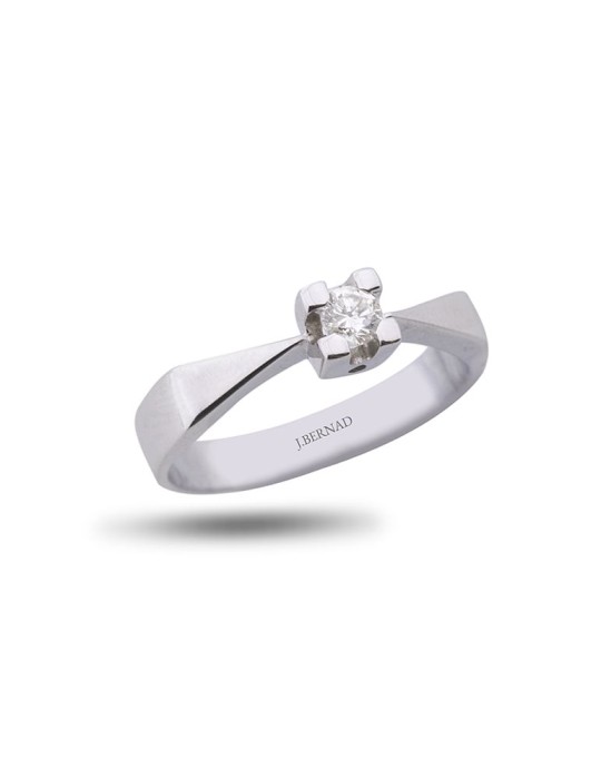 Solitario de oro blanco 18K con brillante de 0,14 ctes en garra tipo Cartier
