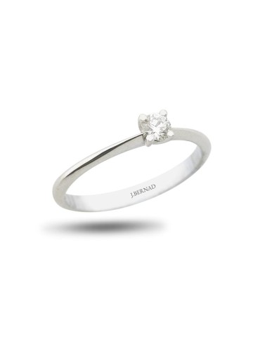 Solitario de oro blanco 18K con brillante de 0,15 ctes, brazo cuchillo y garra en V