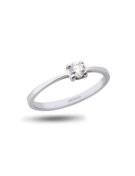 Solitario de oro blanco 18K con brillante de 0,20 ctes y brazo plano en disminución