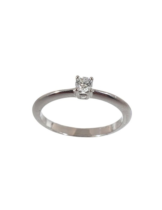 Solitario de oro blanco 18K con brillante de 0,11 ctes, brazo cuchillo y garra de 4 patas