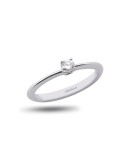Solitario de oro blanco 18K con brillante de 0,13 ctes, brazo cuchillo y garra de 4 patas