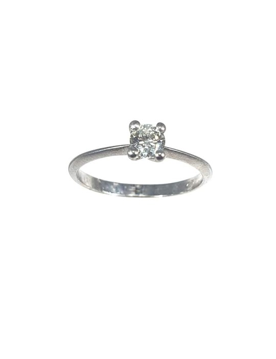 Solitario de oro blanco 18K con brillante de 0,27 ctes, brazo cuchillo y garra tipo Cartier