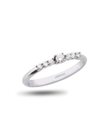 Anillo de oro blanco 18K con brillante central y 6 diamantes laterales de 0,15 ctes